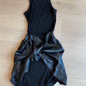 Sleeveless Black Mini Dress with Faux-Leather Knot Detail
